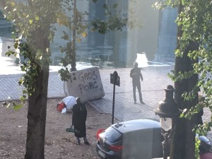 Migrants near the Stalingrad subway station. On the cobblestone: 'Big pig' Photo taken by a friend working nearby.