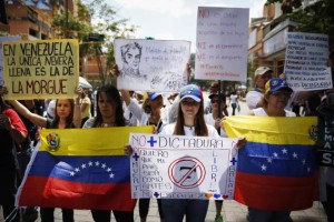 Anti-government protesters take part in a protest against Nicolas Maduro's government in Caracas. https://flic.kr/p/m3v9hL